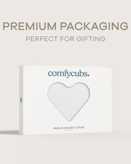 Heart-shaped muslin car seat cover packaging with 'comfcycubs' branding on a light gray background.