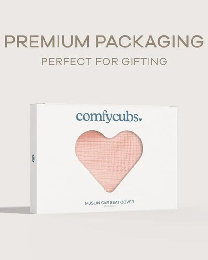 ComfyCubs muslin car seat cover packaging with heart design on a light gray background