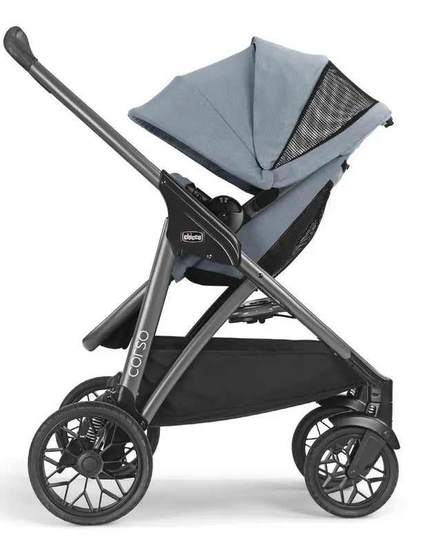Gray stroller with a black frame on a white background