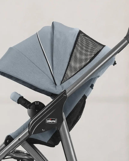 Gray stroller canopy with mesh on a blurred background