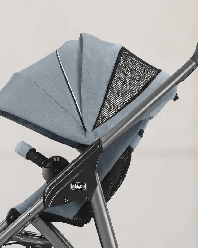 Gray stroller canopy with mesh on a blurred background
