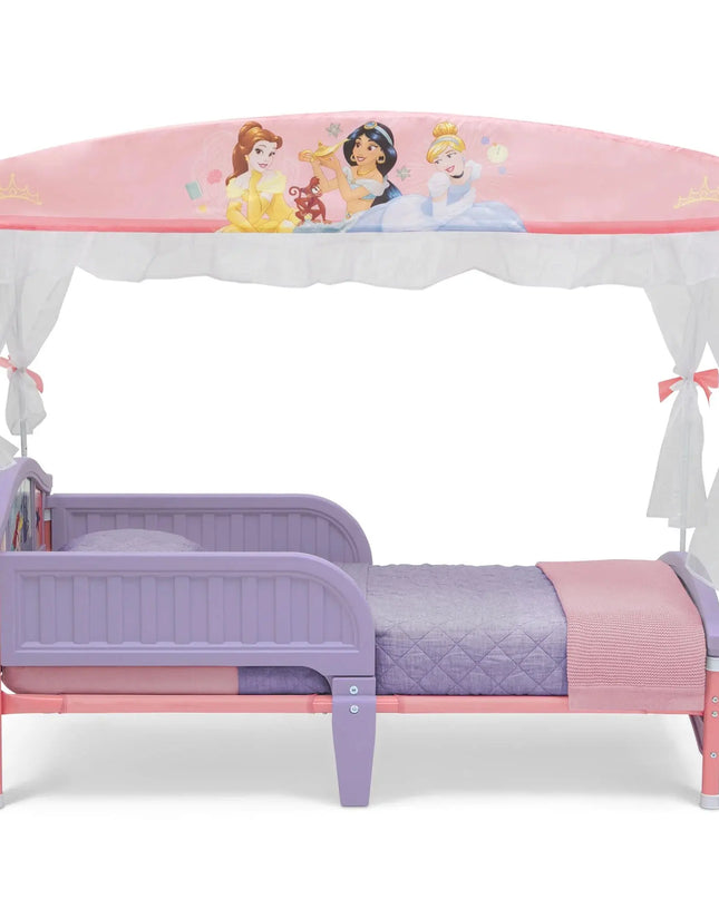 Children's bed with princess-themed canopy and bedding