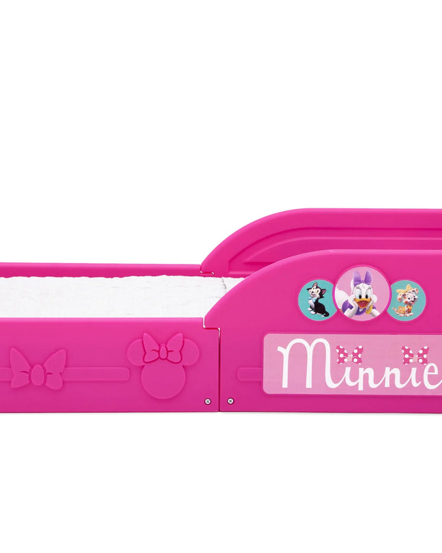 Pink Minnie Mouse-themed children's bed with cartoon characters on a white background