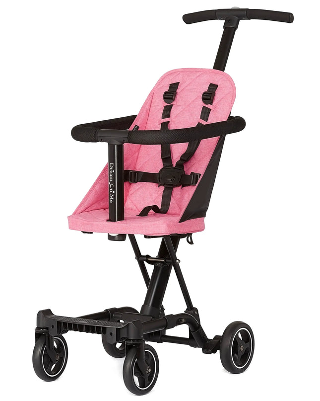 Pink and black stroller on a white background