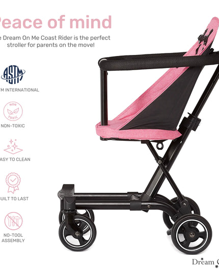 Pink and black stroller with safety certification logos on a white background