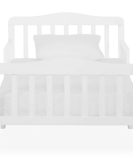 White crib with mattress and bedding on a white background