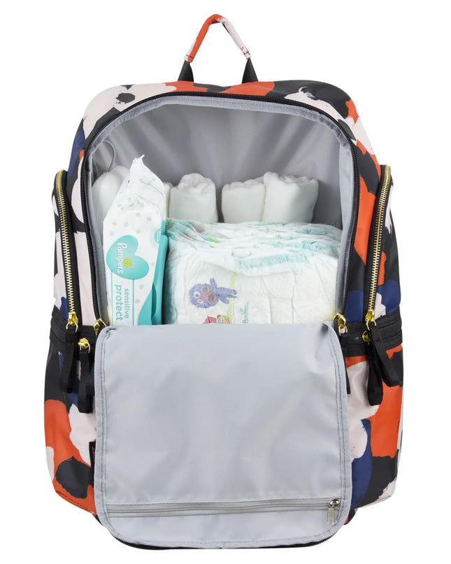 Backpack with colorful design filled with baby items on a white background