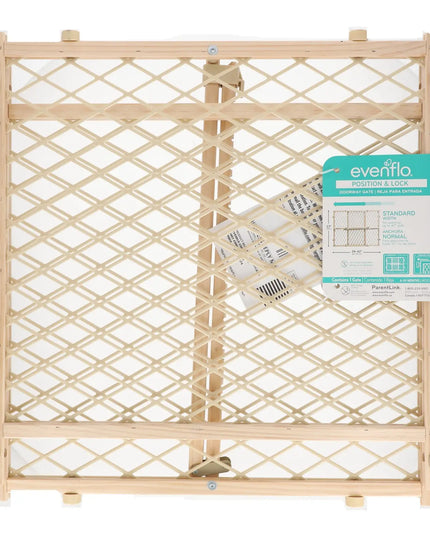 Wooden pet gate with a visible brand label on a white background