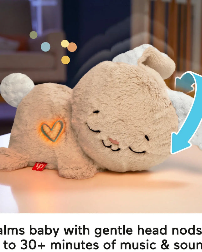 Plush toy with heart design on a wooden surface, labeled for calming baby with music and sounds.