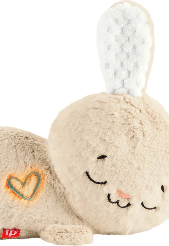 Plush toy rabbit with a heart design on a white background