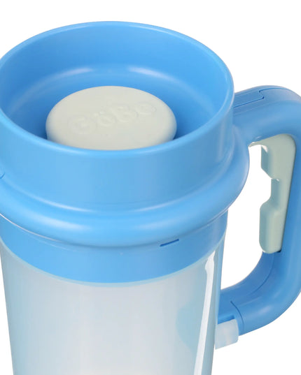 Blue travel mug with a handle on a white background