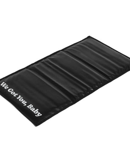 Black cooling mat with 'We Got You, Baby' text on a white background