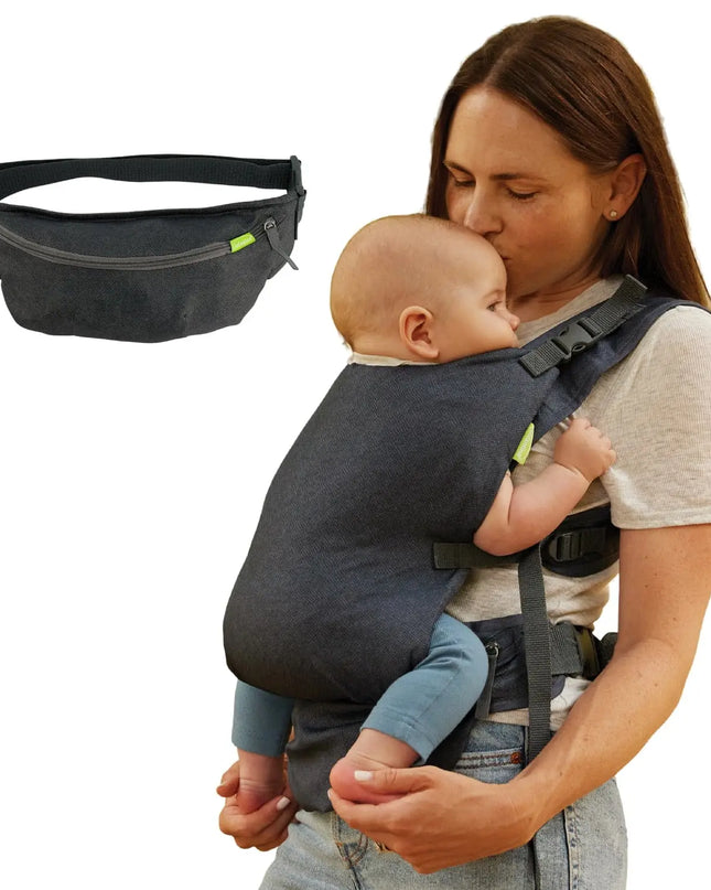 Woman holding a baby in a carrier with an additional black waist bag on a white background