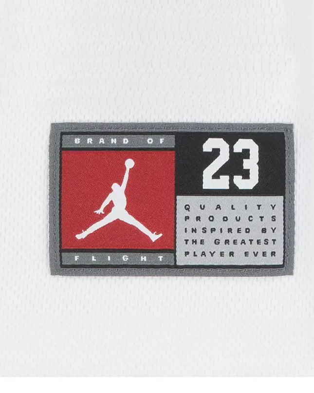 Logo patch with 'Brand of Flight' and number '23' on a white background
