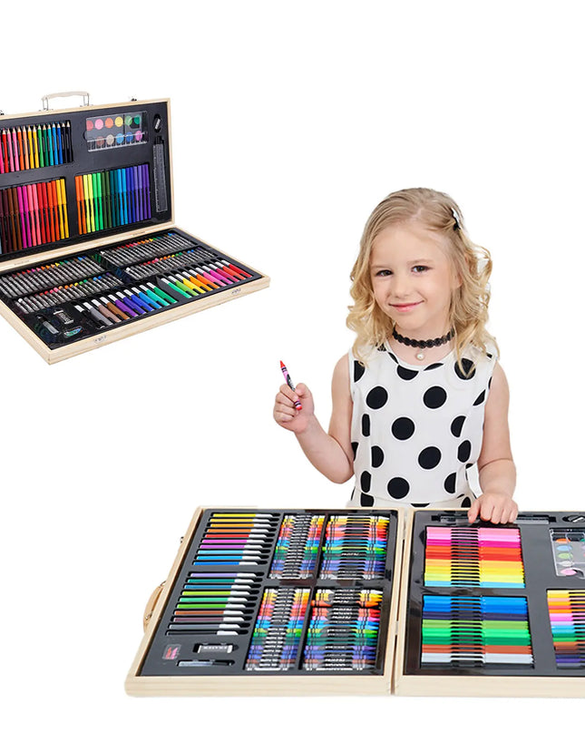 Child holding a color pencil with a large wooden art set on a white background