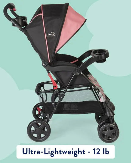 Black and pink stroller on a light green background with text indicating weight.