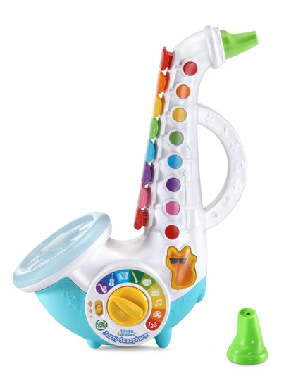 Colorful toy saxophone with various buttons on a white background