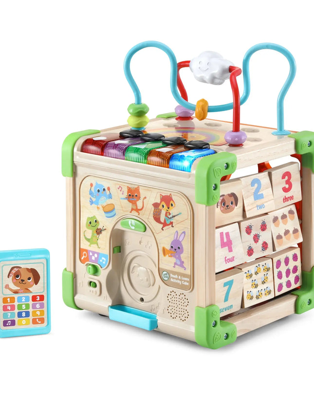 Children's educational toy with various interactive elements on a white background