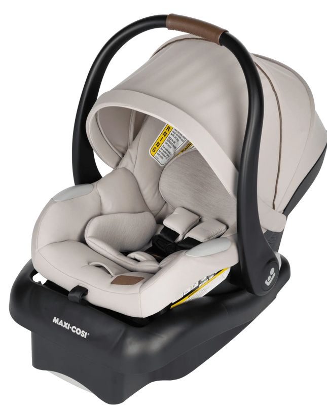 Maxi-Cosi car seat with canopy on a white background