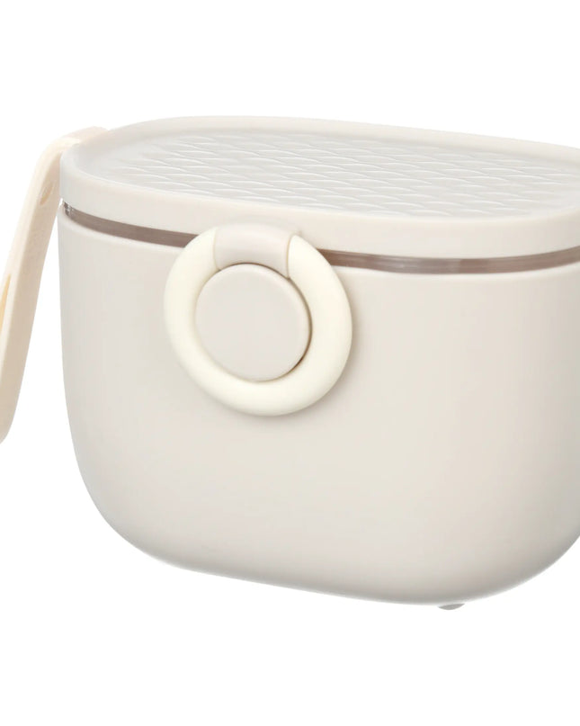 White silicone formula dispenser container with a strap on a white background