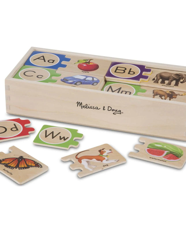 Wooden alphabet puzzle set with Melissa & Doug branding on a white background