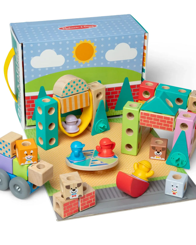 Wooden toy set with colorful blocks and shapes on a play mat, featuring Melissa & Doug branding.