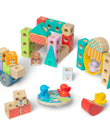 Colorful wooden toy set with various shapes and structures on a white background