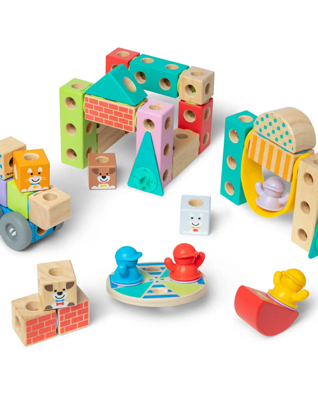 Colorful wooden toy set with various shapes and structures on a white background
