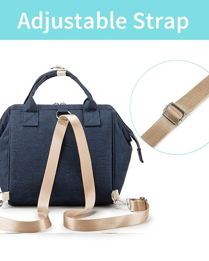 Navy blue bag with beige adjustable strap on a white background