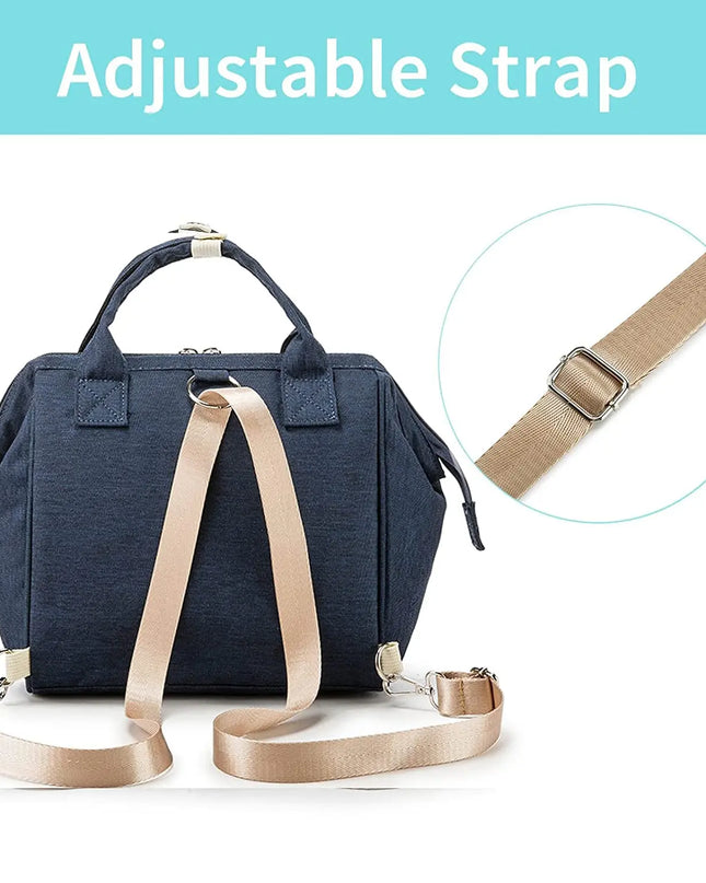 Navy blue bag with beige adjustable strap on a white background