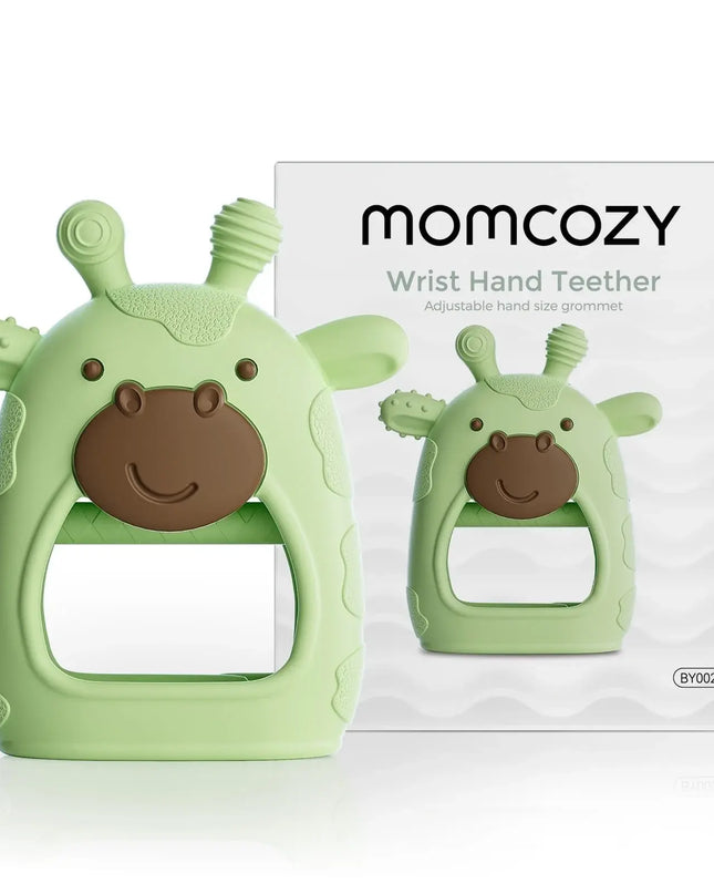 Green wrist hand teether with brown face and packaging displaying 'momcozy' brand on a white background.