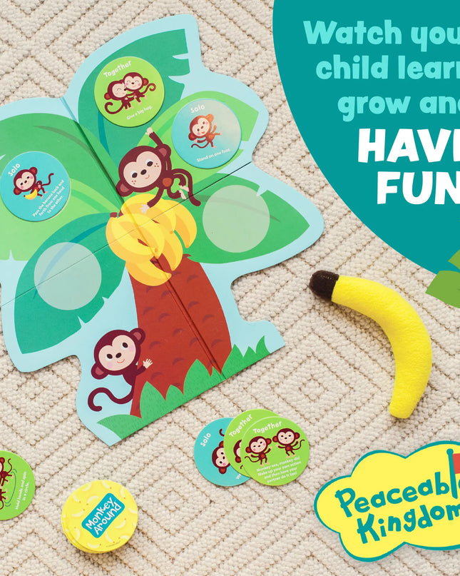 Educational children's toy with monkey and banana design, featuring the Peaceable Kingdom brand.