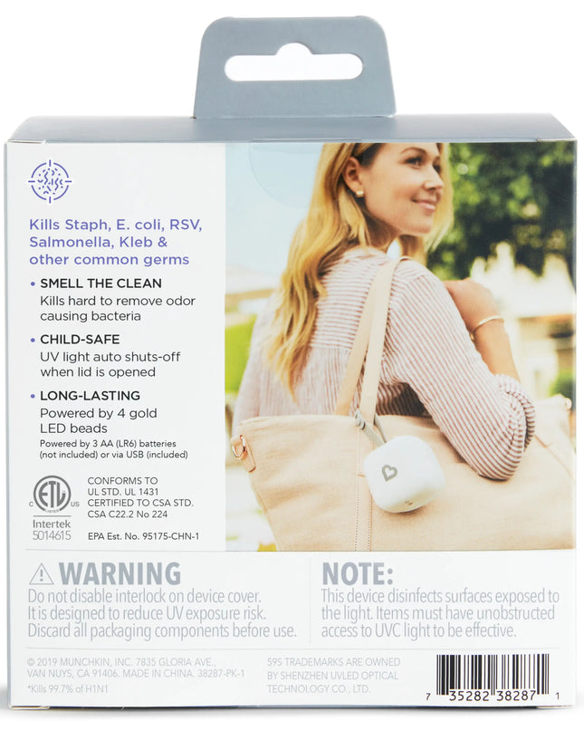 Product packaging with a woman using a device, text about germ-killing properties, and a barcode.