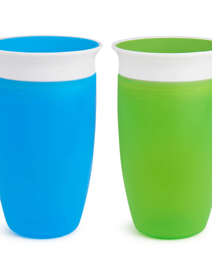 Two colorful cups, one blue and one green, on a white background