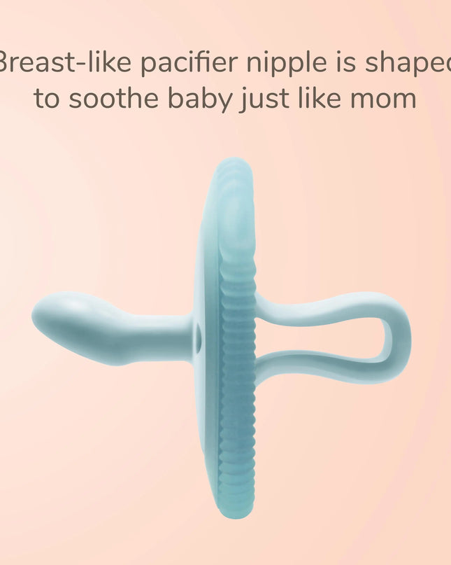 Blue pacifier nipple on a pink background with text about its design.