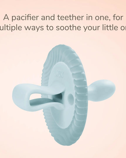 Teal silicone pacifier and teether on a light pink background with text.