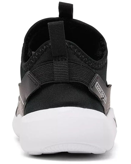 Black sandal with white sole on a white background