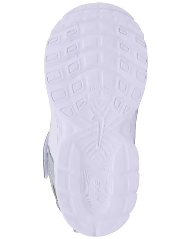 White shoe sole with tread pattern on a white background