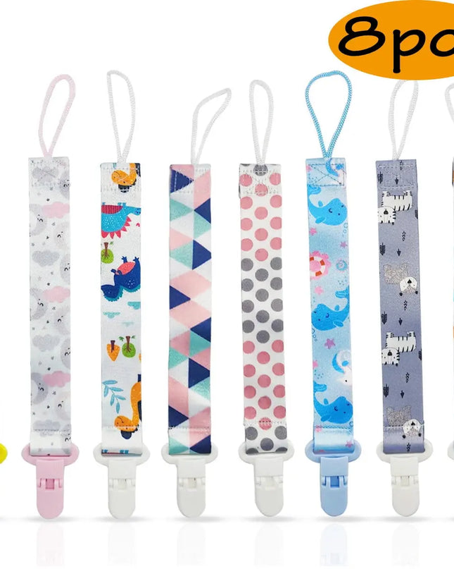 Set of 8 colorful pacifier clips with different patterns on a white background.