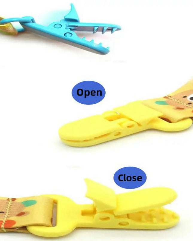 Yellow cartoon shark-shaped clips showing open and closed positions on a white background.