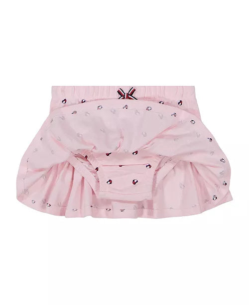 Pink skirt with ruffles on a white background