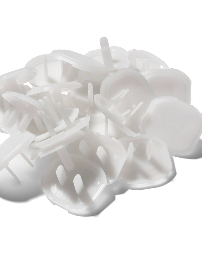 White plastic clips on a white background