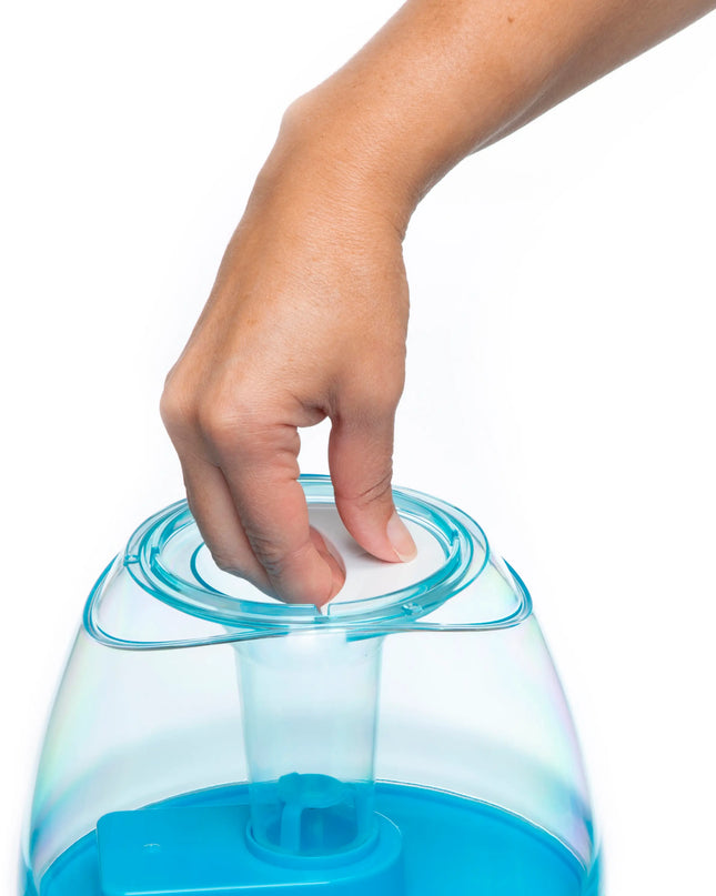 Hand interacting with a blue and clear container on a white background
