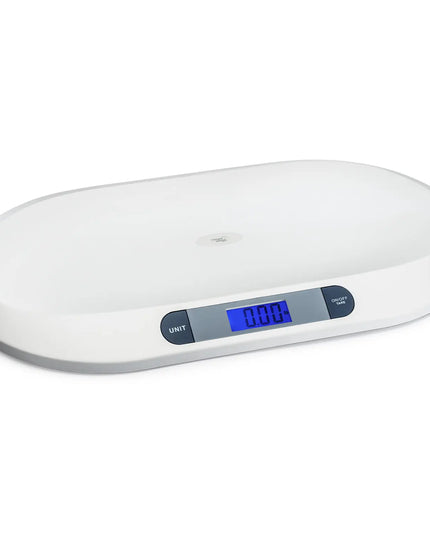 Digital baby scale with a white surface and blue digital display on a white background