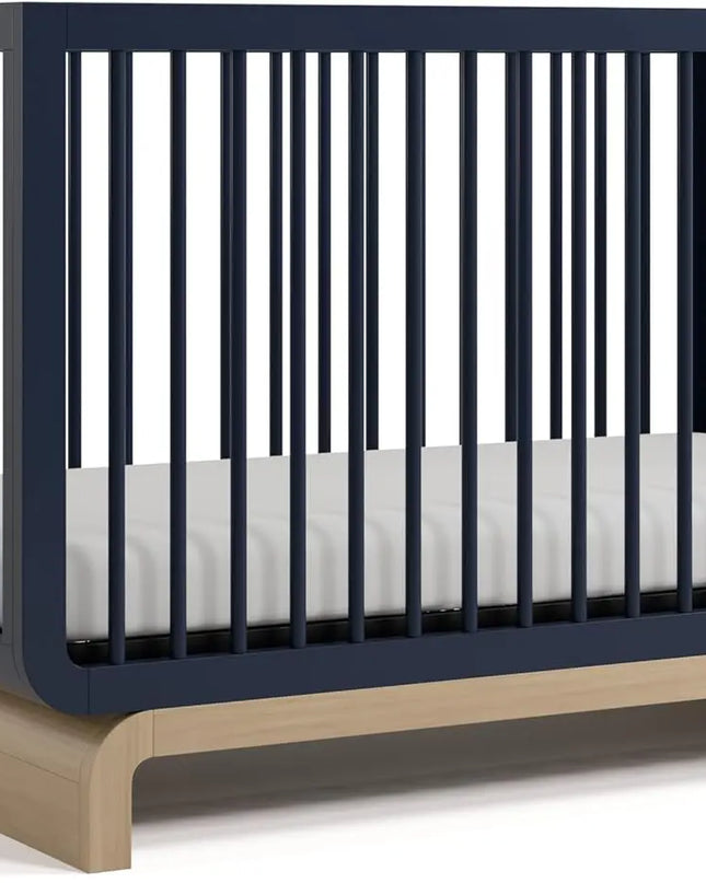 Navy crib with wooden base on a white background