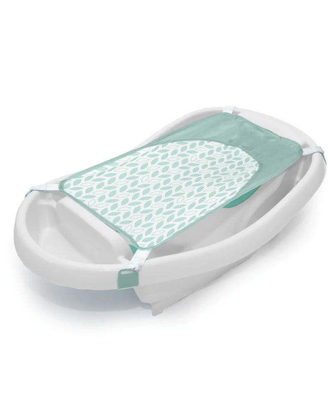 Baby bathtub with green mesh cover on a white background