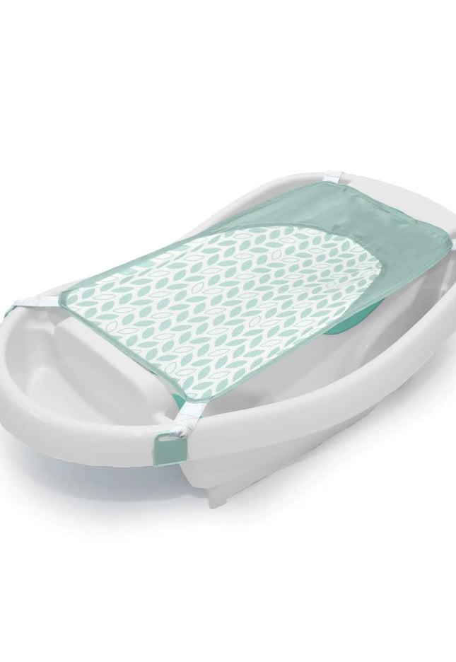 Baby bathtub with green mesh cover on a white background
