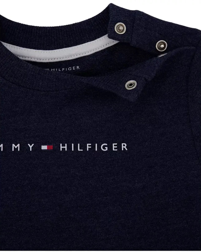 Tommy Hilfiger logo on a navy blue shirt collar