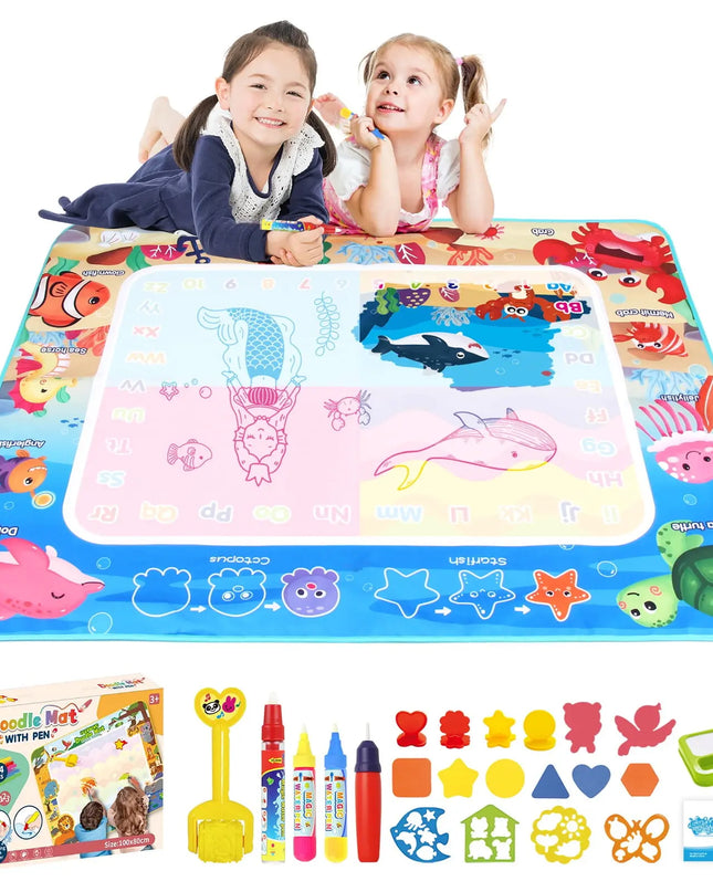 Two children playing with a colorful water drawing mat and accessories on a white background.