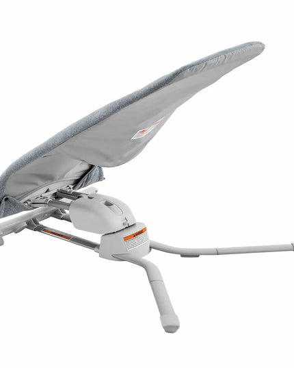 Gray saddle with a white base and orange accents on a white background
